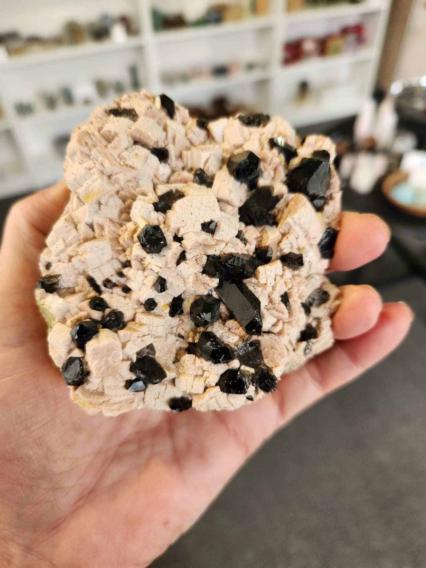 Black Quartz in pink feldspar with epidote